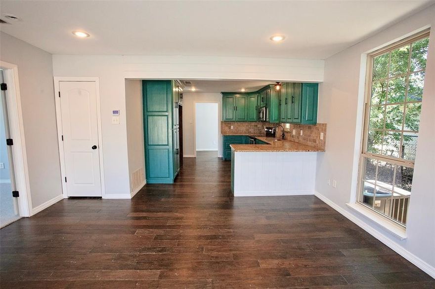 This beautifully remodeled home offers modern updates with timeless style. Renovated just a few years ago, it features a 2020 HVAC system, foam insulation, updated plumbing and electrical, recessed lighting, and energy-efficient windows. Inside, you’ll find fresh paint throughout and brand-new carpet, giving the home a crisp, move-in-ready feel.

The kitchen showcases newly painted custom cabinetry, stainless steel appliances, and granite countertops. The two guest bedrooms are connected by a Jack-and-Jill bath with a stylish tiled shower surround. The spacious primary suite easily accommodates a king-size bed and includes a walk-in closet. The primary bath is appointed with custom cabinetry, granite countertops, and a tiled walk-in shower.

Outside, enjoy a generous backyard complete with a storage shed and privacy fence—perfect for outdoor entertaining or relaxing in private. With all the thoughtful updates, this home is truly move-in ready and a must-see!