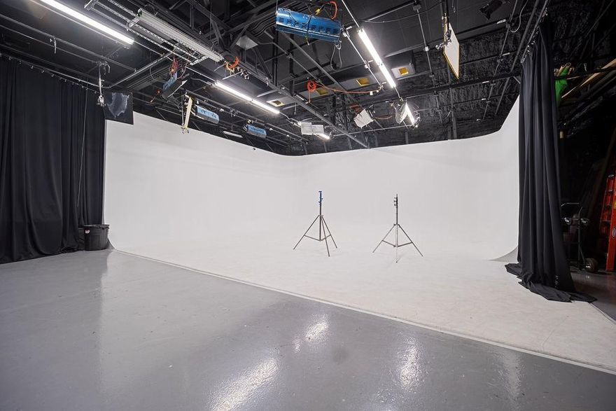 An incredibly rare opportunity in Downtown Dallas, this multi functioning commercial studio features 3 editing suites, 4 private offices, community office space, 2 studios, and a 3-sided cyclorama (infinity) wall. Studio A provides surrounding space up to 2,100 SQ and Studio B is room in room soundproof with its own 1,200 SQ. The space also includes 5 restrooms, 2 relaxing lobbies for guests.  Along with its perfect city view, this property also includes its very own private living quarters located at the back of the building with access from Allen Street. The renovated space contains 1 primary suite, 1 guest bedroom, 2 restrooms, living room, and full kitchen. In addition to its many functions, this location is all within a 10 minute proximity of newly renovated neighborhoods, restaurants, nightlife, and trending buzz in downtown. The creative possibilities are endless for this one of a kind building.