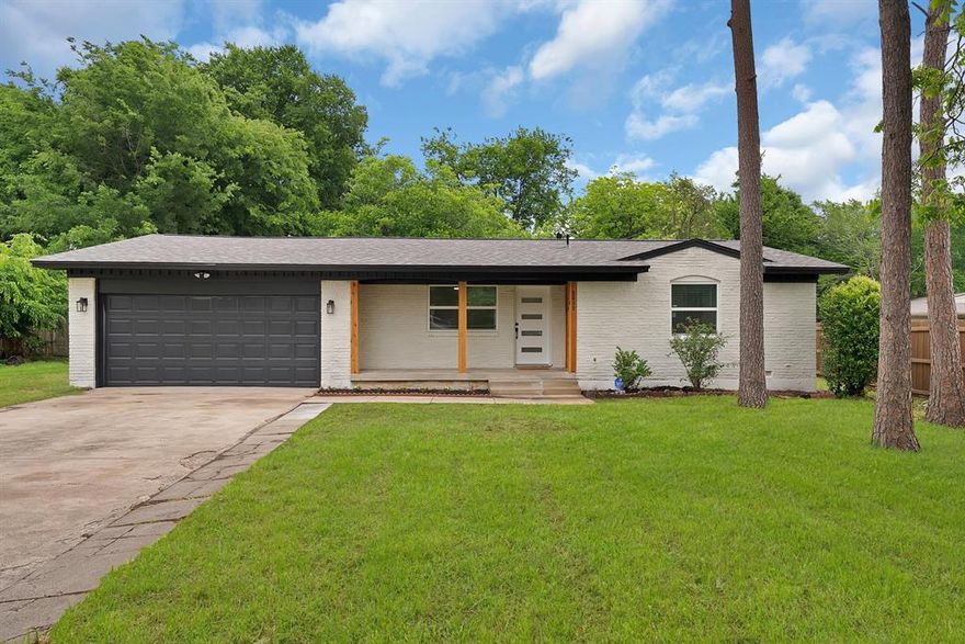 Fully renovated home on a quiet cul-de-sac! This 3 bed, 2 bath gem sits on a large, tree-lined lot and has been transformed top to bottom with modern finishes. The open-concept living and kitchen area features luxury vinyl plank flooring, recessed lighting, and a dramatic oversized island with quartz countertops. White cabinetry, subway tile backsplash, and sleek pendant lighting complete the kitchen. The primary suite offers a walk-in closet, walk-in shower with built-in niche, and quartz vanity. French doors open to a generous backyard surrounded by mature trees. Modern curb appeal with cedar accents and a covered front porch. THIS HOME QUALIFIES FOR GRANTS 5K-10K!
