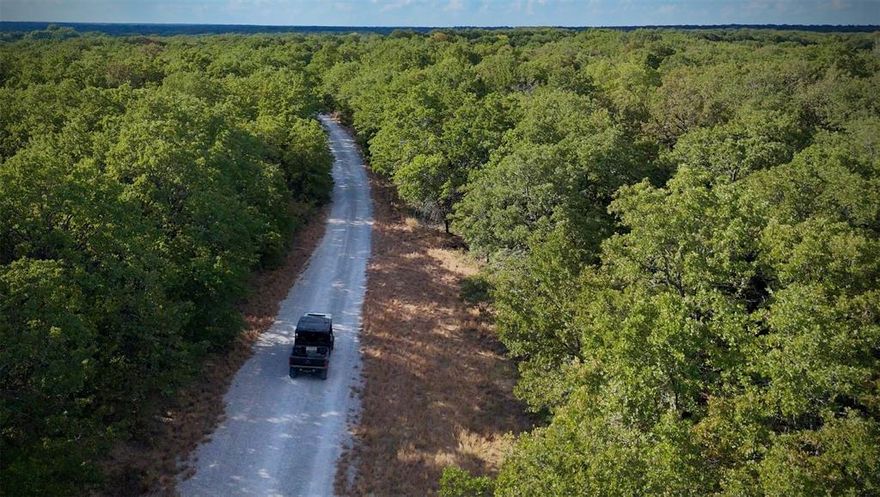 The Alamo Ranch is 87 +- acres in Montague County. This property is ideal for recreational hunting, grazing cattle, building your weekend cabin or dream home. The wooded terrain creates a native wildlife habitat and provides some of the best hunting in north Texas. The ranch has a functioning water well, septic, and electricity in place. Location: The property is approximately 10 miles east of Bowie, Texas, 58 miles southeast of Wichita Falls, 78 miles northwest of Fort Worth and there is easy access to the property via FM 1758 to a county-maintained gravel road. The ranch is just north of Denton Creek, a great travel corridor for many species of wildlife. Land: This 87 +- acre ranch features a combination of hay fields for livestock grazing or hay production, and wooded terrain for hunting. Heavy hardwoods along the creek bottom make for nice roosting areas for turkey.