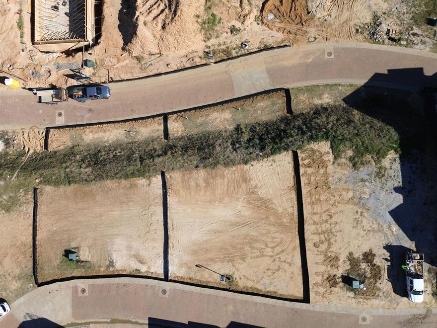 Tucked inside the highly sought-after Entrada enclave in Westlake, this exceptional homesite offers the rare chance to design a custom residence in one of the area’s most thoughtfully curated communities. Entrada spans 85 acres of artfully planned streetscapes, blending European-inspired architecture with a vibrant, pedestrian-friendly atmosphere where boutique dining, retail, and entertainment are woven seamlessly into daily life. 
This 0.14-acre lot allows you to bring your vision to life—whether building with the renowned Brian Michael Distinctive Homes or selecting another approved builder in accordance with Entrada’s architectural standards. The setting delivers not only refined living, but also access to top-tier education, including Carroll ISD and the prestigious Westlake Academy International Baccalaureate program. Perfectly positioned for both ease and escape, Entrada places you minutes from DFW International Airport, Alliance Airport, Westlake’s new Life Time Fitness, Grapevine Lake, Historic Downtown Grapevine, and the upscale shops and dining of Southlake Town Square. A rare opportunity to create a custom home in a community where elegance, walkability, and convenience converge.