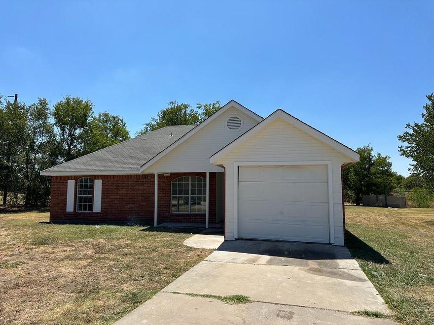 225 Brook Circle, Krum, TX 76249 is a 3 bedroom, 2 bathroom, 1-story brick home with an attached 1-car garage and located on 0.3 Acre of land. The home features laminate flooring and ceramic tile.  This property is available for $1,795 per month Rent.
