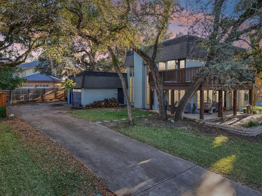 Talk about location!  Take a look at this lakeview stunner on a corner lot.  Cozy neighborhood, beautiful updates throughout, and a quick drive up Boat Club to parks and Trails, and down boat club to Food and Shopping!  Wrap around patio and 2nd floor deck off of the primary suite!  Sky high ceilings in the living room with a wonderful fireplace ready for some cold Texas winter weather.  These opportunities don't come around very often, so take advantage and call for a tour!