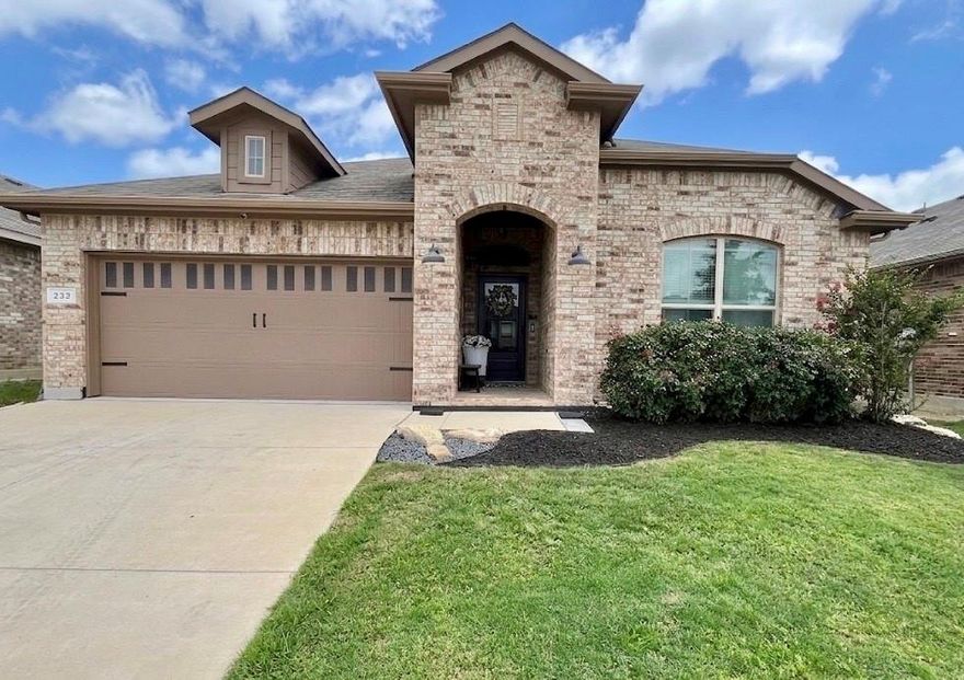Better than new and thoughtfully upgraded, this 4-bedroom, 2-bath home offering 2,022 sq ft features the popular Blanco floor plan by D.R. Horton and is located in the highly sought-after Northwest ISD. Built in 2022, the home offers the advantages of modern construction with numerous upgrades already completed. Tile flooring runs throughout the entire home with no carpet, providing durability and easy maintenance. Builder upgrades include full perimeter gutters, cordless faux wood blinds, additional recessed lighting in the office, and upgraded exterior lighting.
Since completion, the homeowners have added stylish improvements including updated light fixtures throughout, ceiling fans, a custom spare bathroom vanity with vessel sink and upgraded faucet, and rainfall plus handheld shower heads in both bathrooms. The kitchen and pantry area feature custom touches such as a custom pantry door, open shelving in the butler’s pantry, and added upper cabinetry in the office nook for additional storage. All recessed lighting has also been upgraded to bright daylight LED lighting.
The backyard has been improved with a leveled yard and extended concrete patio, creating a great space for relaxing or entertaining. With modern finishes, thoughtful upgrades, and a prime location in Northwest ISD, this move-in-ready home offers comfort, style, and convenience.