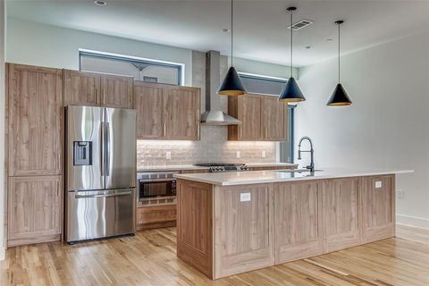 Photo of 5609 Live Oak Street #404, Dallas, TX 75206 (MLS # 21165281)