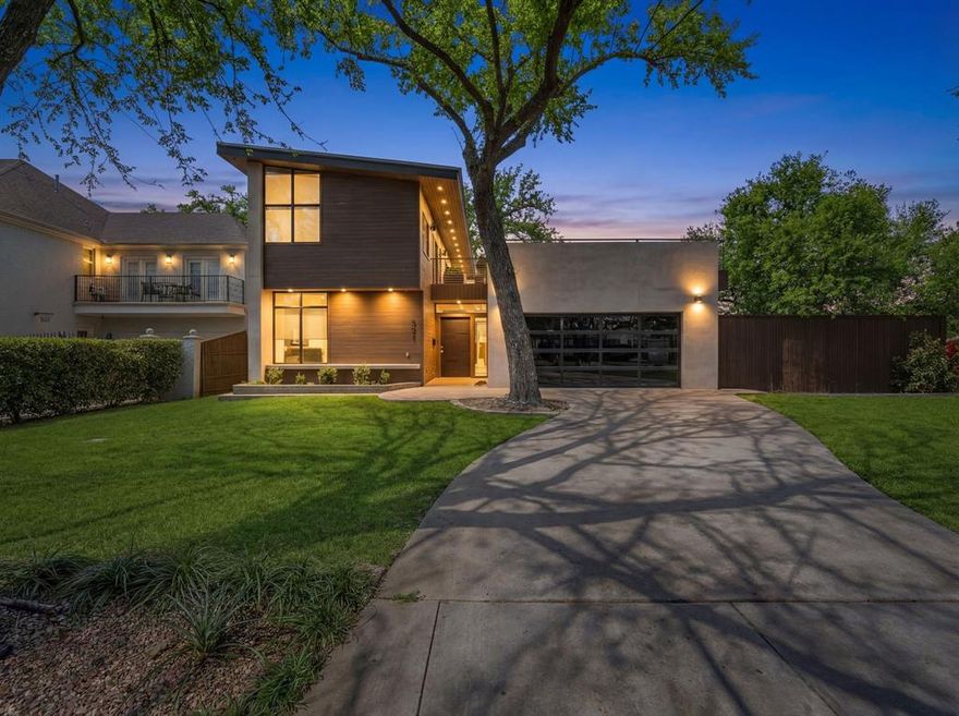 Experience refined modern living in one of Fort Worth’s most coveted locations—Crestwood, directly adjacent to the Trinity River and trailhead. Originally featured on the cover of 360 West Magazine, this architectural showpiece was completely reimagined in 2022, blending striking design with effortless functionality. Privately positioned yet moments from the city’s best dining, culture, and entertainment, the home offers a rare balance of serenity and accessibility. Inside, curated spaces are designed for both intimate living and elevated entertaining—from the sophisticated living room to a warm sitting area anchored by a dramatic steel fireplace. A designer bar with ice maker, refrigeration, and statement mercury glass creates a seamless flow for hosting. The chef’s kitchen is a true centerpiece, showcasing European-inspired wood-grain cabinetry, waterfall quartzite surfaces, a 48-inch gas range, and an expansive eat-in island. Walls of glass open to multiple outdoor living areas, creating a seamless indoor-outdoor experience. Upstairs, an industrial steel staircase leads to a private rooftop terrace—ideal for sunset views and entertaining above the treetops. The primary suite is a luxurious retreat, featuring vaulted ceilings, a private balcony, and a spa-inspired bath with dual walnut vanities, a steam shower, and a custom-designed closet. A well-appointed secondary suite offers its own en suite bath and walk-in closet. This is a rare opportunity to own a design-driven home in a premier location—where luxury, lifestyle, and convenience converge.