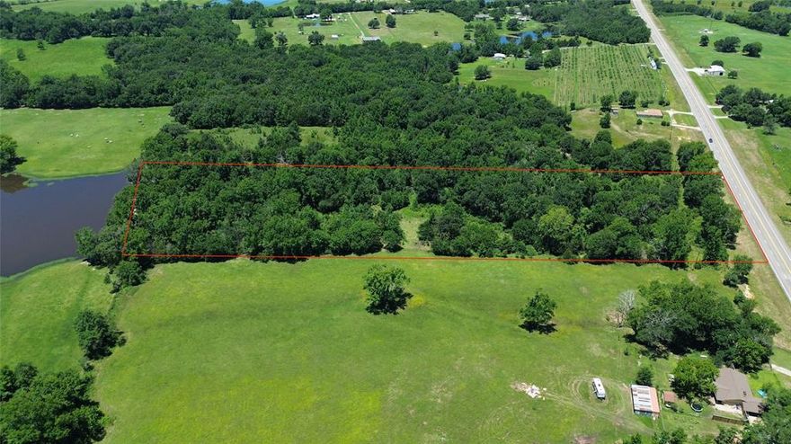 If you want a nice piece of land in Ben Wheeler, look no further.  Rare chance to own 10 beautiful, wooded acres in Ben Wheeler, Tx. Established trees and some cleared land, fenced and with highway frontage and driveway for easy access to the property. Come build your dream house or use for recreational purposes, or just get away to your own wooded paradise. Van ISD and a short drive to Tyler, Canton and Dallas. This is 10 acres being divided out of a larger parcel; survey will need to be done to establish exact property lines. House and buildings to the left do not go with the sale, pond is not part of the property. Survey in documents includes all acreage and house. 10 acres will have to be divided out. The house number is 12099 Hwy. 64, acreage is before the house if coming from Ben Wheeler