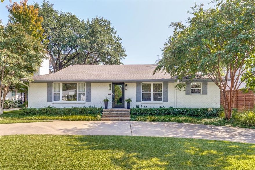 Tastefully updated mid-century ranch and ideally located in the heart of Preston Hollow between Preston Rd. and Edgemere, this one level home is situated on a wide 80 ft. frontage treed lot. With four bedrooms and four full baths, two living and two dining areas, the open floor plan and split bedroom arrangement offers versatility and comfortable living and is conducive for entertaining. Amenities include hardwood floors throughout, stainless and granite kitchen, granite and marble baths, freshly painted, designer lighting, and auto gate across driveway. The professionally landscaped and fenced backyard offers an outdoor living area with arbor and TV. Amazing opportunity to reside in a very sought -after neighborhood, Preston Hollow.