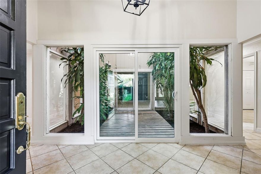 This beautifully updated 4-bedroom, 2-bath home sits on a quiet cul-de-sac and backs directly to Timbercreek Park, offering peaceful views from the primary bedroom, living room, and backyard. Built in 1978, the home has been thoughtfully refreshed while keeping its original character and warmth.

At the center of the home is a stunning 12' x 14' glass-enclosed atrium, filling the space with natural light and providing a gorgeous view the moment you walk through the door. Inside, you’ll find fresh paint throughout, scraped popcorn ceiling, and new quartz countertops in both bathrooms. The shingles are approximately 3 years old, and the recent sod and landscaping add great curb appeal.

Located in a highly desirable area of Flower Mound, this home offers the perfect balance of comfort and convenience — a private cul-de-sac setting, a backyard that opens to a park, and zoning for desirable Flower Mound schools.
NO SURVEY