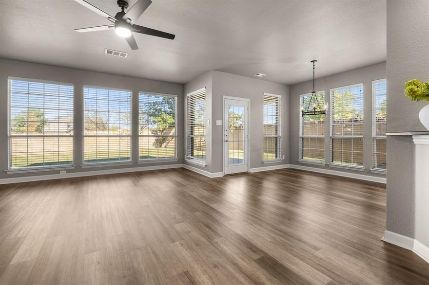 1145 Dayton Drive is a a beautiful 4-bedroom, 3.5-bath residence perfectly situated on a spacious corner lot with plenty of room to relax and entertain! From the moment you step inside, you’ll be captivated by the the home’s open, inviting layout accentuated by  the luxury vinyl plank flooring that flows throughout the main living areas. The front entry welcomes you with a private study—ideal for remote work—and a formal dining room perfect for hosting special occasions. The chef-inspired kitchen features granite countertops, ample cabinetry, a large island and a 2025 microwave and dishwasher—the perfect centerpiece for family gatherings. Your primary suite is tucked away on the main level, boasting luxury vinyl plank floors, a spa-like ensuite bath, and a spacious walk-in closet. Upstairs, you’ll find three additional bedrooms and two full baths, along with a spacious game room and a separate media room—the ultimate setup for movie nights or game days! The oversized laundry room comes complete with a sink for added convenience. Boasting insulated doors, the 3-car garage provides both comfort and functionality. Additional upgrades include a 2025 roof. Lantana residents enjoy access to top-rated schools, scenic walking trails, resort-style pools, new pickleball courts, amenity centers, and more. Schedule your private showing today—your perfect home awaits!