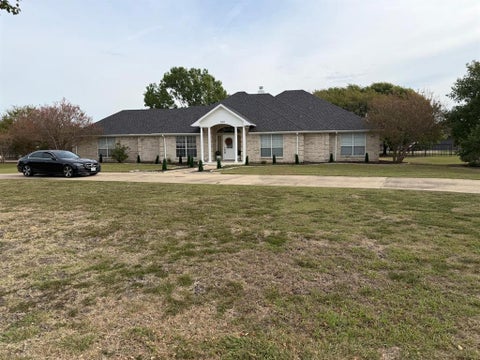 Photo of 1165 E Oaklawn Drive, Talty, TX 75160 (MLS # 21409331)