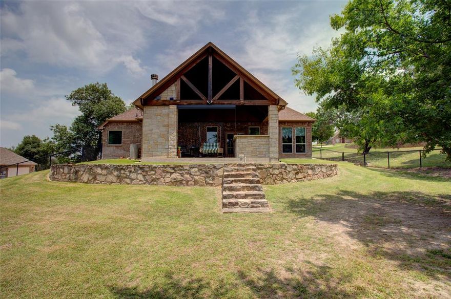 Welcome to 136 Meadow Arbor Drive in Weatherford—where lush green surroundings and a thriving community meet peaceful country living. Situated on a beautifully maintained one-acre lot in the desirable Ellis Creek Ranch area, this property offers space, comfort, and convenience.

This open-concept home features 4 bedrooms, 2 bathrooms, and 2 living areas with a split-bedroom layout for added privacy. The spacious primary suite provides a relaxing retreat at the end of the day.

Outdoors, enjoy scenic views, a fenced yard for kids or animals, and solar lighting along the driveway. The outdoor living area is perfect for entertaining, complete with a Green Egg for cooking and gathering.

The property includes septic and plenty of room to garden, play, or simply unwind. The neighborhood features two fishing ponds and sits across from an equestrian farm, enhancing the peaceful setting.

Recent updates include a new water heater, upgraded insulation, security cameras and doorbell, a new water tank, and a water softener system. A riding lawnmower and refrigerator may be included with a strong offer.

Conveniently located just 2.5 miles from downtown Weatherford, 25 minutes to Fort Worth, and about 70 minutes to DFW Airport—this home offers the best of country living with easy access to the city.