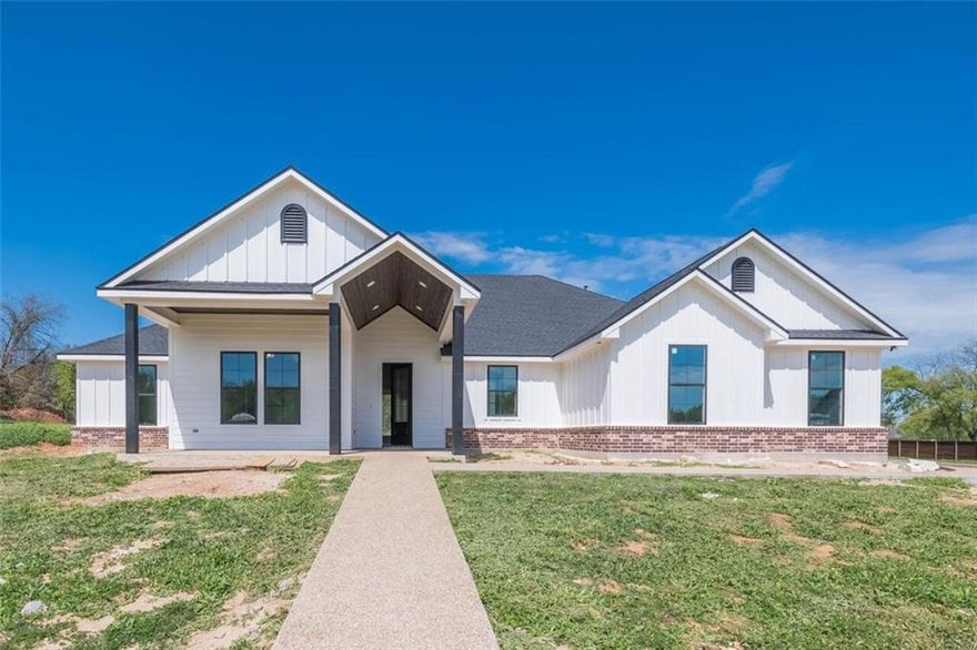 Gorgeously done NEW CONSTRUCTION that sits on over half an acre in the highly sought after Fox Run Addition in Robinson ISD! This 4 bedroom, 2.5 bathroom home is decked out inside and out with beautiful custom detailing within every space.  The floor plan is functional, cozy and open with a bright and airy color palette throughout each space.  You will enjoy the SPECTACULAR kitchen, dreamy sized pantry, the spacious living space with a wood burning fireplace and a great-sized dining area.  The master suite is secluded with a HUGE walk-in closet, double vanities and MUCH MORE! The exterior has a SPRAWLING covered patio to entertain the masses and endless room to roam on one of the biggest lots in the addition! Come see all that this home has to offer—built by a very well known local builder! PRIVACY FENCE, gutters, blinds, two trees, landscaping, irrigation and sod will all be completed before closing.