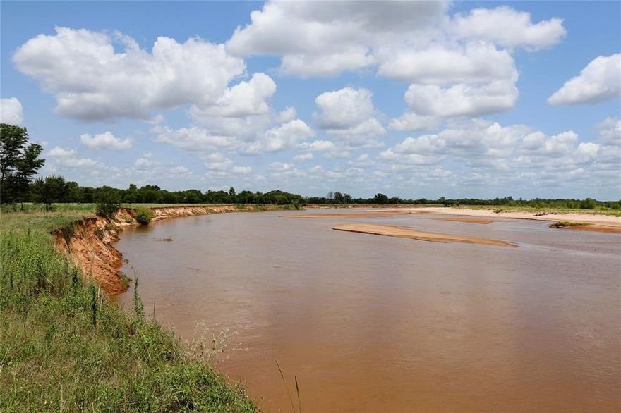 408 Acres Stanfield Red River Ranch. Incredible views for miles of the Red River Valley! Dense hardwood thicket gives way to grassy savannas along the live water. Almost .5 mile of river frontage to build your own private boat ramp into the deep side of the river and let the adventures begin. Outstanding whitetail deer and feral hog hunting. Huge catfish can be found in the river and stocked ponds offer bass and perch. Secluded ranch house tucked into the hillside makes for a welcoming country home. Home is a 3 bedroom, 2 bath pier and beam with brick exterior and composition roof. Enclosed back porch and outside sitting area. Barn workshop is approximately 40 x 50 with a concrete floor. Equipment barn with enclosed room approximately 30 x 60.