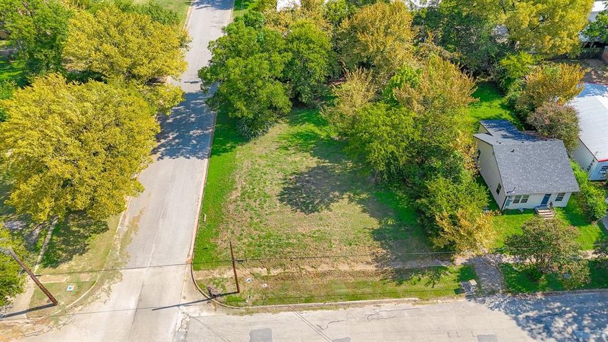 Nestled within the bustling city limits of Corsicana, Texas, you'll discover a hidden gem—an enchanting .198-acre corner lot awaiting your creative vision. This vacant parcel of land embodies the essence of urban tranquility while offering a canvas for your dreams to flourish.
Don't miss the chance to make your mark on this blank canvas in the heart of Corsicana—a space where your dreams can take root and flourish. This vacant corner lot embodies the essence of urban potential and awaits the touch of an inspired visionary to transform it into something truly remarkable.