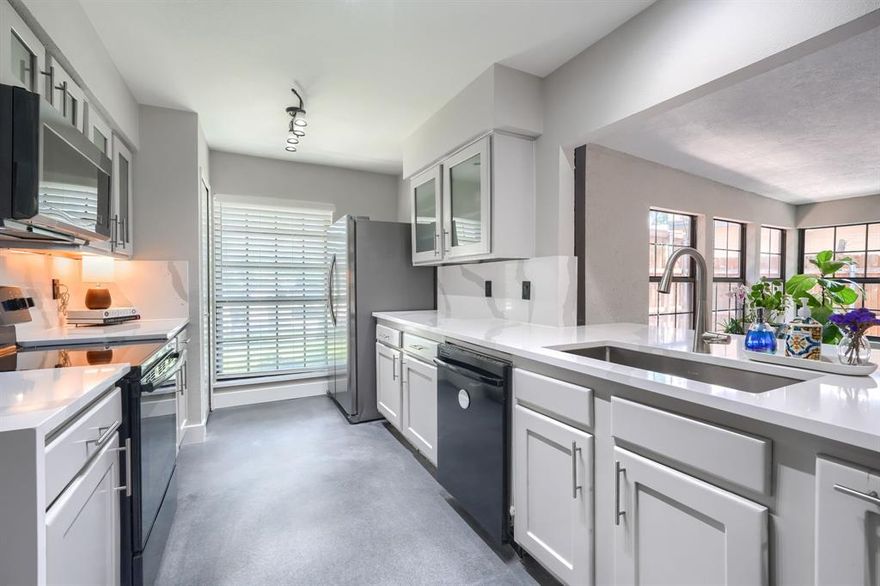 This 4-bedroom, 2-bath home checks all the boxes if you’re looking for space, style, and comfort with a location that keeps you close to downtown Dallas but gives you room to breathe. Inside, you’ll find a bright, welcoming layout with thoughtful updates throughout. The kitchen features sleek quartz countertops and a walk-in pantry that’s ready to handle everything from easy weeknight dinners to elaborate gatherings.

The primary suite is a true retreat, with two closets for that extra room you desperately want but don't often get. The other bedrooms are generously sized, offering flexibility for guests, a home office, or hobbies.

One of the best surprises is the huge bonus room. It's currently set up as a gym, but it could easily become your game room, media room, or anything else you can dream up.

Step outside, and you’ll see what really sets this home apart. The backyard is massive and it was a huge selling point when the current sellers bought the home. It's fully enclosed with an 8 foot privacy fence and a solar powered automatic gate. There’s space for kids, pets, backyard barbecues, or just relaxing in the shade of the many mature trees. There’s even a cozy fire pit area, perfect for those evenings when you want to unwind under the stars.

All of this comes with a short, easy commute to downtown Dallas, so you don’t have to choose between convenience and having the space you want. This is the kind of home that truly lets you have both. See update list in the transaction desk for a full list of updates.

Home address qualifies for multiple loan programs with preferred lender. Ask agent for details. The accuracy of all information provided in this listing, including but not limited to room dimensions, lot sizes, schools, taxes, and amenities, should be independently verified by the buyer and the buyer's agent.