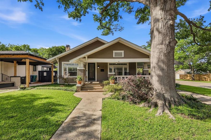 Fall in love with this beautifully updated 1923 Craftsman on a coveted corner lot in Fort Worth’s highly sought-after Arlington Heights. Rich in historic character and timeless architectural details, this charming home seamlessly blends original craftsmanship with thoughtful modern updates. From the inviting covered front porch shaded by a magnificent red oak tree to the original hardwood floors, glass doorknobs, built-in bookcases, and classic cased openings, every space reflects the warmth and authenticity that make Craftsman homes so beloved. Architectural highlights of this Craftsman home include wide overhanging eaves, tapered porch columns, built-in cabinetry, and an open yet intimate floorplan designed for comfortable everyday living and entertaining alike. Home still maintains its original carriage height porte cochere accented by a blue green ceiling. The updated kitchen features granite countertops, stainless steel appliances, double wall ovens, a gas cooktop, and abundant storage. The stylishly renovated guest bath showcases a handsome clawfoot tub, while the private primary suite offers dual closets and an en-suite bath with marble vanity and striking geometric tilework. Enjoy quiet mornings on the welcoming front porch, relaxing evenings beside the working gas log fireplace, or unwind on the private back patio complete with a tranquil fountain. Additional features include ceiling fans throughout much of the home, generous storage, and a detached 2-car garage. Perfectly positioned near the Fort Worth Cultural District, Dickies Arena, Downtown Fort Worth, University of North Texas Health Science Center, and Texas Christian University, this exceptional residence offers historic charm, modern comfort, and an unbeatable location in one of Fort Worth’s most treasured neighborhoods. Recent 2023 improvements include attic insulation, side fencing, and hot water heater replacement. Home has a rich history that is preserved by the Linden Avenue Historic District.