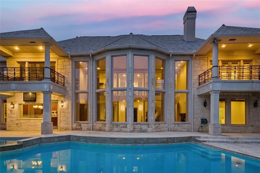 A rare opportunity in one of Las Colinas' most prestigious gated communities, positioned directly on the fairways of The Nelson Golf & Sports Club at Ritz-Carlton Las Colinas.

This expansive residence delivers the best of resort-style living with every detail designed for both grand entertaining and everyday comfort. A dramatic two-story foyer with sweeping staircase sets the tone, opening to formal living and dining rooms framed by cast-stone columns and rich custom millwork. The gourmet kitchen flows into a light-filled family room with panoramic views of the manicured greens.

Two primary suites—one on each level—offer flexibility for multigenerational living or guest privacy. The upstairs retreat includes a private gym and spa-inspired bath. Three additional bedrooms, a dedicated home office, media room, and oversized game room with covered balcony complete the layout.

Step outside to your own backyard oasis: sparkling pool, spa, and covered patio with uninterrupted golf course views—ideal for morning coffee or sunset cocktails. A 4-car garage accommodates vehicles, golf carts, and all the extras.

Scale, privacy, and a front-row seat to the Nelson golf experience. This is Las Colinas living at its finest.