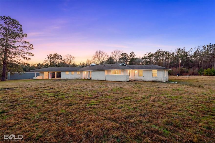 Discover peaceful country living with modern comfort in this beautifully remodeled 5 bedroom, 3 bathroom home offering 2,424 square feet of living space and originally built in 1970. Thoughtfully updated throughout, the home features new floors, fresh paint, new lighting fixtures, and durable new LVP flooring that complement the inviting and functional layout. The remodeled kitchen and bathrooms showcase stylish finishes and provide a fresh, contemporary feel while maintaining a warm and welcoming atmosphere. A brand new architectural roof adds long term value and peace of mind. Situated on a picturesque 5 acre tract with two ponds, this property offers endless opportunities for outdoor enjoyment, recreation, and relaxation. With woods along the west side and rear of the home, you will enjoy exceptional privacy and a quiet, peaceful setting that feels like a true retreat. Whether you are looking for space to spread out, room for hobbies, or a serene place to call home, this move in ready property delivers the perfect blend of comfort, style, and natural beauty.