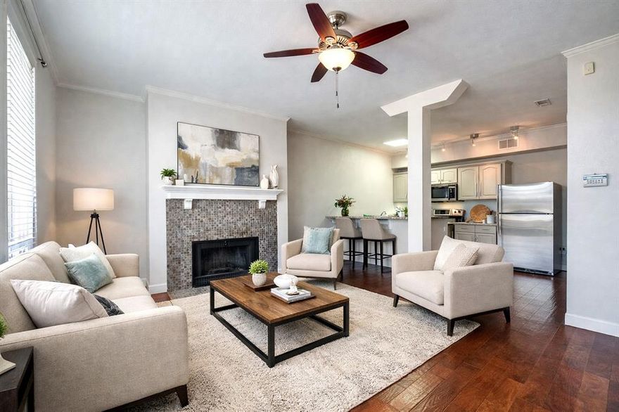 Rare top-floor split-bedroom condo in the heart of Lakewood
located in a charming gated community with New Orleans–inspired courtyards. Splitbedroom layout offers two private bathrooms and excellent privacy. Hardwood floors
throughout the living room, kitchen, and bedrooms. Bright living area features bay
windows, crown molding, accent lighting, and a wood-burning fireplace. Kitchen includes
granite countertops, stainless steel appliances, and full-size washer and dryer. Primary
suite includes walk-in closet and updated bathroom with new shower door. Covered
balcony overlooks the community pool. Two assigned gated parking spaces (one covered)
and elevator access. Community pool, pool house, secure gated entry, and beautifully
maintained courtyards. Recent updates include HVAC (2024), washer and dryer (2024),
master shower door (2026), kitchen faucet (2026), and updated vents and exhaust fan.