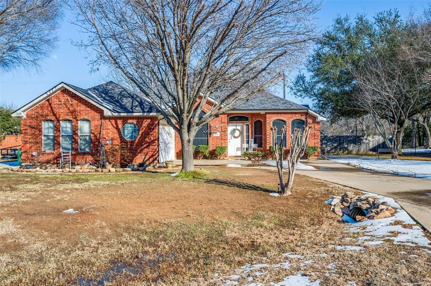 This immaculately maintained move in ready 4-bedroom, 2 full-bath home is situated on a spacious half-acre lot in a quiet cul-de-sac within a highly sought-after community near Lake Dallas.  This inviting residence features a thoughtfully designed, functional floor plan filled with natural light. The yard includes a full coverage sprinkler system, enhancing both curb appeal and ease of maintenance.  Generous outdoor space offers endless possibilities for entertaining, recreation, or future customization.