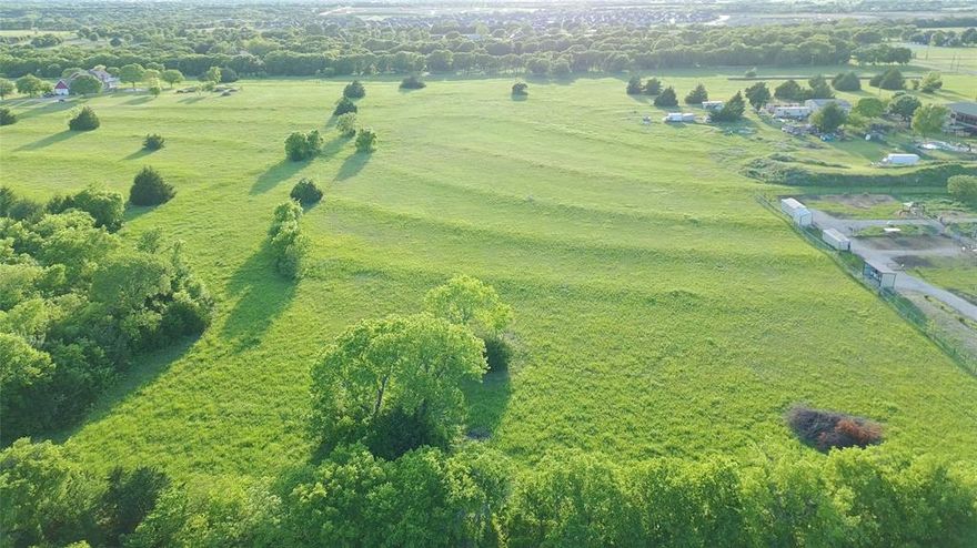 Rare opportunity to own 5.03 private acres in McKinney within PROSPER ISD with a secluded driveway that sets the homesite well back from the road for complete privacy. Enjoy peaceful country living with room for horses, gardens, workshops, or your dream custom home.

No HOA, yet located within the Bloomdale Farms Restrictions, Conditions & Covenants, ensuring the street remains residential only with a minimum 1,250 sq ft build requirement and no temporary structures — protecting long-term value and character.

Wide open space, fresh air, and quiet surroundings — all just 10 minutes from Costco, shopping, dining, and major conveniences. The perfect blend of rural freedom and city accessibility.