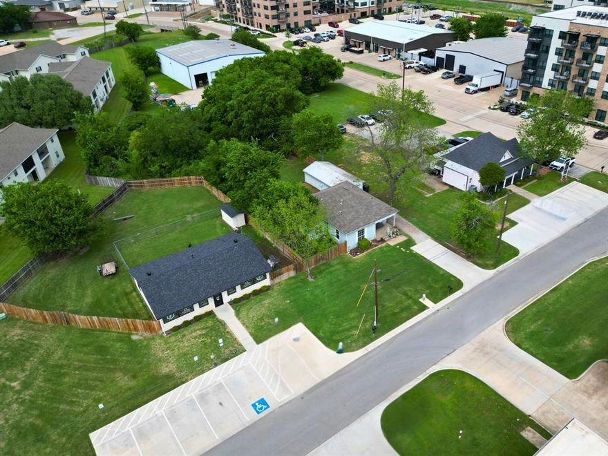 132 W King St sits in the heart of Old Town Burleson, exactly where you want to be if location matters. This property opens the door to a wide range of possibilities, whether you're looking to add to your investment portfolio, expanding, or start your business in a high-visibility area. With potential for residential use or future commercial rezoning, this property has the flexibility you're looking for.
The home offers two bedrooms and one bathroom, with a functional layout that starts with a welcoming living area right as you walk in. The primary bedroom is conveniently positioned off the main living space. Toward the back of the home, the kitchen features an electric range, farmhouse sink, dishwasher, and modern cabinetry and countertops.
The second bedroom sits just off the kitchen, offering decent closet space and direct access to the garage. Nearby, an oversized laundry room includes washer and dryer hookups plus extra room that could easily be converted into a walk-in pantry or additional storage space.
Out back, you’ll find a generously sized yard with updated privacy fencing that gives you plenty of space for entertaining, expanding, or customizing to fit your vision.
If you’ve been waiting for the right mix of location, flexibility, and potential, this is it.
