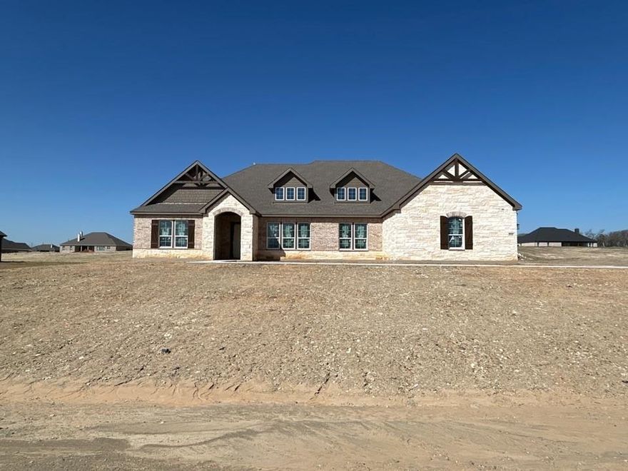 Estimated May 2026 completion! Ask us about our Trade In Trade Up program, we can buy your home! The Foxglove floor plan is a stunning single-story home offering 4 bedrooms, 3 full baths, and a versatile study-flex space that can easily serve as a 5th bedroom. Designed for both comfort and
entertaining, this spacious layout features three separate living areas and a beautiful open-concept design. Step outside to enjoy the inviting outdoor fireplace on the back patio- perfect for relaxing evenings. An elegant and thoughtfully designed home that blends style, space, and functionality.
Nestled in a peaceful, tree-lined community, modern country living within a highly rated school district, A rare blend of space, comfort, and style- this is one you won’t want to miss!