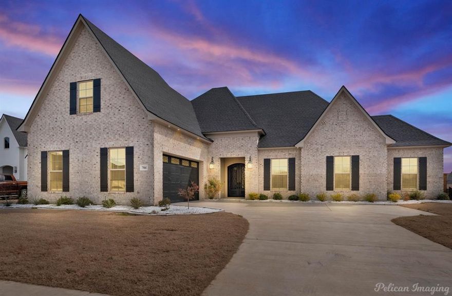 Beautiful Home 4 Bedrooms 3 baths Bonus Room upstairs with a full bath, in Waterford Lake Subdivision with Waterfront one year old home. A Custom Sollevare Home development behind Legacy Elementray off Swan Lake Road, this home is a Stunner that has exquistic furnishings beautiful gold lighting fixtures thru out with oversized rooms. Beautiful flooring, beautiful granite thru out, Extras to the outside covered patio kitchen, the garage has tile that looks like Marble and has beautiful furniture and a kitchen with air conditioning and heat, furniture can be purchased, Black Iron front door, with tile at the entrance, white rocks in the flower beds, Wood blinds thru out, a fully backyard stained fenced, wood flooring on the stairs. Best of everything with beautiful appliances. A must see. Beautiful dream home can be yours! Home has never been lived in and the upstairs game room has a closet, so could be used as bedroom 5 if needed. Elementary School is walking distance from this home. Owner changed the size of many rooms to make larger. Garage has an Airconditioning, and is beautiful.