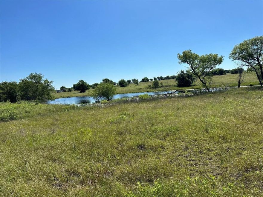 This stunning property features beautiful rolling hills, creating a picturesque and serene landscape. With paved road frontage for easy access, as well as electricity and Bolivar water available at the road, this land is ready for you to bring your vision to life. Whether you're looking to build a dream home, start a farm, or invest in a peaceful retreat, this property offers the perfect blend of convenience and natural beauty.