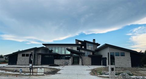 Photo of 207 Sunset Point Trail, Heath, TX 75032 (MLS # 20853737)