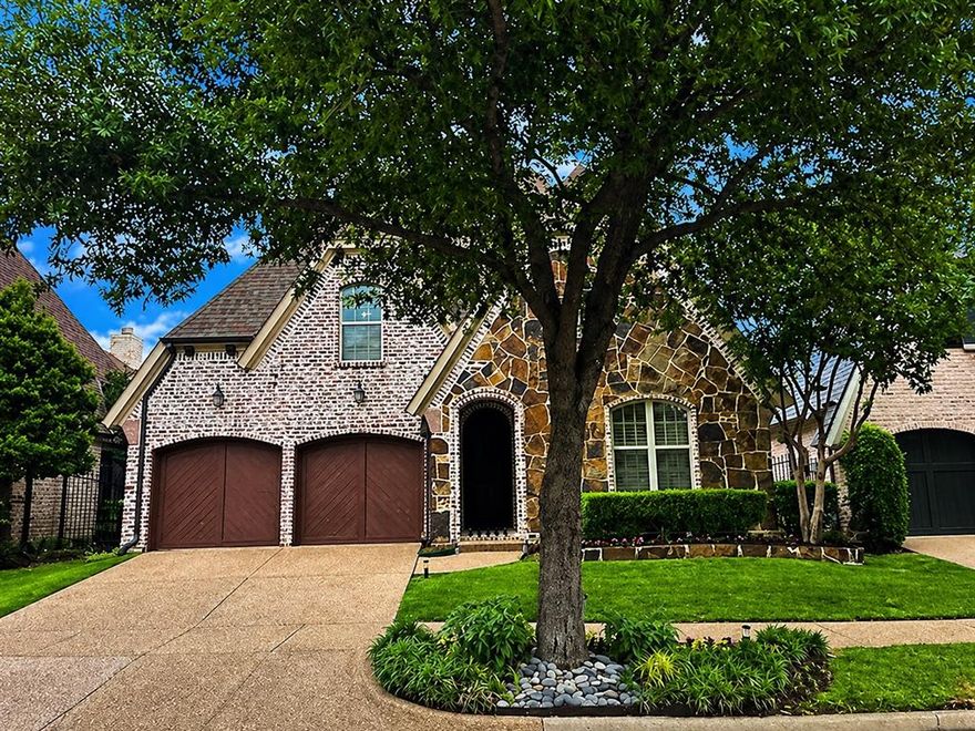 Back on the market at no fault of the property - buyer got cold feet. Sophisticated, modern, and simply unmatched—welcome to true luxury living in the ultra-private, gated community of Cambridge Gate. Bathed in natural light, this home offers an open, airy ambiance enhanced by fresh paint and carpet (April 2026), soaring domed ceilings, and a striking two-sided fireplace. The seamless flow between the dining, living, and kitchen spaces creates an inviting environment designed for both everyday living and entertaining, all anchored by stunning views of the resort-style pool from the main living area and primary suite. The chef’s kitchen is exceptional, featuring an oversized island, stainless steel appliances, 6-burner gas cooktop with professional vent hood, double ovens, extensive cabinetry, and expansive granite countertops. A large pantry and nearby laundry room add convenience and functionality. A thoughtful split-bedroom layout provides privacy, with two spacious secondary bedrooms sharing a well-appointed bath, while the primary suite is tucked away as a true retreat. Enjoy tranquil pool views and unwind in the spa-inspired bath complete with jetted tub, separate shower, dual vanities, and a generous custom closet. Step outside to a secluded backyard oasis—complete with a covered living area and fireplace, beautifully manicured landscaping, and an expansive deck ideal for dining, lounging, and entertaining under ambient lighting and mature trees. Upstairs, a versatile bonus space offers the perfect setting for a home office, gym, or flex room. Roof replaced May 2026. Ideally located just minutes from the President George Bush Turnpike, Dallas North Tollway, and premier shopping and dining at Preston Park. Zoned to Plano ISD with access to several top private schools nearby. Low-maintenance living meets refined elegance—this is a rare opportunity in Cambridge Gate.
