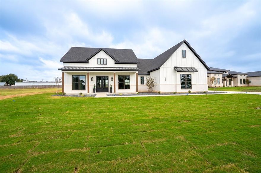 This is your chance to live in stunning Modern Oaks, Granbury! The classic modern farmhouse offers 4 bedrooms, 3.5 bathrooms, and a spacious three-car garage, packed with upgrades. Highlights include quartz countertops in every room, a chef's kitchen featuring an expansive island, spray foam insulation, and much more—all set on a one-acre lot. This home is move-in ready.