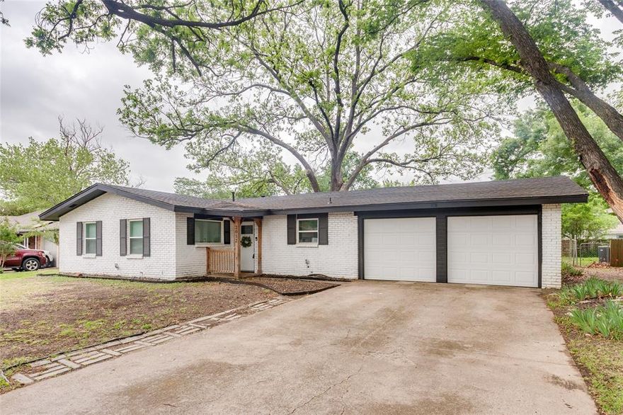 This recently renovated 3 bedroom, 1.1 bath home has an open concept with newer flooring, crown molding, doors and baseboards as well as the addition of a utility room with pantry. Kitchen updates include the sink, disposal and appliances and the inclusion of a dishwasher in 2025. Bathrooms were a part of the renovation too and add to the overall look and feel of this refreshed and appealing property. A color pallet of cool grays and the right white make this family-friendly floor plan a great fit for any discerning buyer. Step outside and enjoy the shade from the pergola covered back porch or the majestic trees while entertaining in the over-sized backyard. Located close to all of life's necessities, this home is near several main thoroughfares including Hwy 360 and both Interstates 20 and 30. And it's a quick trip to DFW or Arlington's renowned entertainment district. Come see this one...you won't be disappointed.