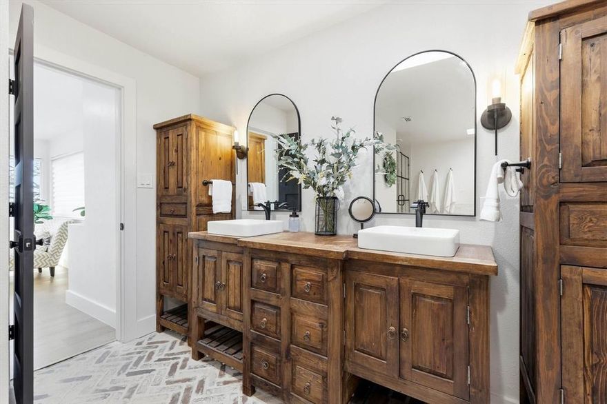 NO HOA, LAKE VIEWS, absolutely wonderful home! If you have been looking for a home that has been looked after & taken care of- look no further. Location is amazing!! Ability to add guest house, call agent for more detail. This home features two primary suites. Main primary suite is located downstairs with two separate closets & remodeled bathroom. Secondary primary bedroom is located upstairs with its own private newer deck & a completely remodeled bathroom. Or use the upstairs room as a huge game room. Office that could be a 5th bedroom has a closet, has shared bathroom with other bedroom. Beautiful eat in kitchen features gas cooktop & plenty of space for entertaining. Living room features a remodeled fireplace with new firebox that makes for a cozy place to sit by the fire. Enjoy resort-style outdoor living with a sparkling salt water pool & spa with views of the lake, a built-in grill with a spacious dining area, & multiple backyard spaces designed for relaxation and entertaining. Three separate backyard areas are perfect for anything from creating a garden to running around to hosting parties. Courtyard is perfectly placed between the garage & home. One secondary bedroom, that was completely remodeled down to the studs, leads to the backyard with the shed. It has its own private covered back patio. Perfect for guests or anyone who would like to have their own entrance. Some updates include new engineered hardwood floors, completely redone drainage, new sprinkler lines, every gas line redone with the ability to convert existing hot water heaters into tankless, brand new deck off of primary bedroom with gorgeous views of the lake, interior doors replaced with solid core doors, new windows throughout. Very convenient access to 35E or 2499 (Long Prairie Rd) for easy commute to DFW or downtown Dallas. Located near shopping, Doubletree Ranch Park with splash pad, Lakeside Community Park for lake swimming or kayaks, & this neighborhood has private access to the lake.