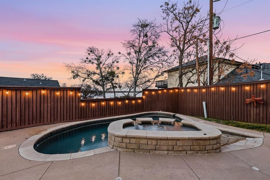 NO HOA, LAKE VIEWS, Room to add guest house, call agent for more detail! Location is amazing!! Prepare meals in the kitchen with views of Lake Lewisville or relax in the hot tub or patio while viewing the lake- stunning! This home features two primary suites. Main primary suite is located downstairs with two separate closets & remodeled bathroom. Secondary primary bedroom is located upstairs with its own private deck, built in 2024, & a remodeled bathroom. Or use the upstairs room as a huge game room. Office that could be a 5th bedroom has a closet and shares bathroom with other bedroom. Beautiful eat in kitchen features gas cooktop & plenty of space for entertaining. Living room features a remodeled fireplace with new firebox that makes for a cozy place to sit by the fire. Enjoy resort-style outdoor living with a sparkling salt water pool & spa with views of the lake, a built-in grill with a spacious dining area, & multiple backyard spaces designed for relaxation and entertaining. Three separate backyard areas are perfect for anything from creating a garden to running around to hosting parties. Courtyard is perfectly placed between the garage & home. One secondary bedroom, that was completely remodeled down to the studs, leads to the backyard with the shed. It has its own private covered back patio. Perfect for guests or anyone who would like to have their own entrance. Some updates include new engineered hardwood floors, completely redone drainage, new sprinkler lines, every gas line redone with the ability to convert existing hot water heaters into tankless, brand new deck off of primary bedroom with gorgeous views of the lake, interior doors replaced with solid core doors, new windows throughout. Very convenient access to 35E or 2499 (Long Prairie Rd) for easy commute to DFW or downtown Dallas. Located near shopping, Doubletree Ranch Park with splash pad, Lakeside Community Park for lake swimming or kayaks, & this neighborhood has private access to the lake.