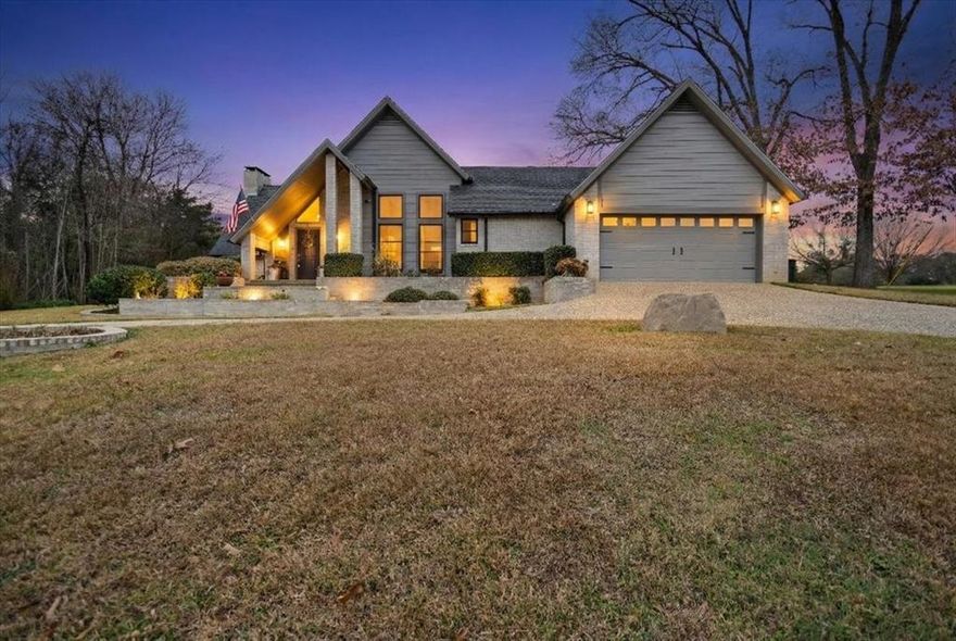 Welcome to this wonderful 3 bedroom, 2.5 bath home located on the golf course in Hideaway Lake and just minutes from the front gate. This beautifully updated home offers both charm and functionality with thoughtful custom touches throughout. The dining room features custom cabinetry that provides extra storage and a perfect space for entertaining. Enjoy a large laundry room with abundant storage to keep everything organized. The spacious primary suite has been updated to include a relaxing soaking tub and a beautifully tiled shower, creating a true retreat. The living room is generously sized and anchored by a stunning wood-burning fireplace, making it the perfect gathering space. A unique spiral staircase leads to one of the upstairs bedrooms, adding character and architectural interest. Step outside to the lovely back patio and take in peaceful golf course views, ideal for morning coffee or evening relaxation. Enjoy all that Hideaway Lake has to offer including golf, lakes, pools, parks, and more, all within a gated community. This home combines comfort, style, and location in one exceptional package.