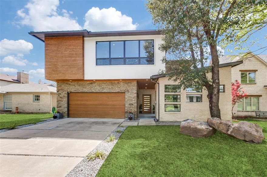 Congratulations! You found it..THE location in Lakewood, with a modern open design and a rare backyard oasis completed in Dec 2022 and still under warranty.  This home is adjacent to the Lakewood Country Club, a block away from access to the Santa Fe Trail, Lindsley Park and White Rock Lake.  CA room with chef's kitchen with Viking appliances with 2 sliding glass doors that open entire back home to new backyard oasis.  2nd story even better with windows EVERYWHERE! Bonus room with built-in wet bar and wine fridge, 4 bedrooms, including the primary suite. The primary has a beautiful treelined view of the oasis and a peek into the downtown Dallas skyline.  Meanwhile, a gas fireplace adjoins the primary bedroom with the primary bath, complete with a Japanese soaking tub, dual head shower and a massive closet.  A detached suite with a fountain view that makes an amazing office or a perfect place for weekend guests is a unique and welcomed addition.  Under contract, open house is cancelled