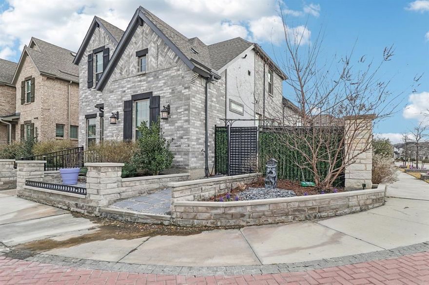 Four-bedroom, west-facing, beautifully maintained, and thoughtfully upgraded, this corner-lot home in Arlington’s highly sought-after Viridian community offers incredible curb appeal with custom flower beds, lush landscaping, and a welcoming front patio. The home features a highly desirable layout with two bedrooms and two bathrooms on the main level, providing flexibility and convenience for guests or multi-generational living. 

Inside, the flexible layout features luxury vinyl plank flooring, custom tile work, upgraded lighting, ceiling fans, and full surround sound throughout the home. You’ll also find two versatile flex spaces—one on each floor—perfect for a study, media room, game room, or additional living area. The gourmet kitchen is a showstopper with extended quartz countertops, custom cabinetry for added storage, a large island, built-in gas cooktop, electric oven, microwave, three-drawer dishwasher, and a walk-in pantry, all overlooking the living room’s inviting gas fireplace.

Step outside to your private backyard retreat featuring a pergola, concrete BBQ pad, chimenea, glass-enclosed patio, and a temperature-controlled swim spa surrounded by lush privacy landscaping and solar fountains. Additional highlights include solar panels, security system, automated exterior and roofline lighting, and a finished 2.5-car garage with epoxy floors and Elfa shelving.

Located in the award-winning Viridian community, residents enjoy lakes, a sailing center, miles of walking and biking trails, parks, pickleball and tennis courts, and saltwater pools—just minutes from shopping, dining, major highways, and about 10 minutes from AT&T Stadium, Globe Life Field, and Texas Live!