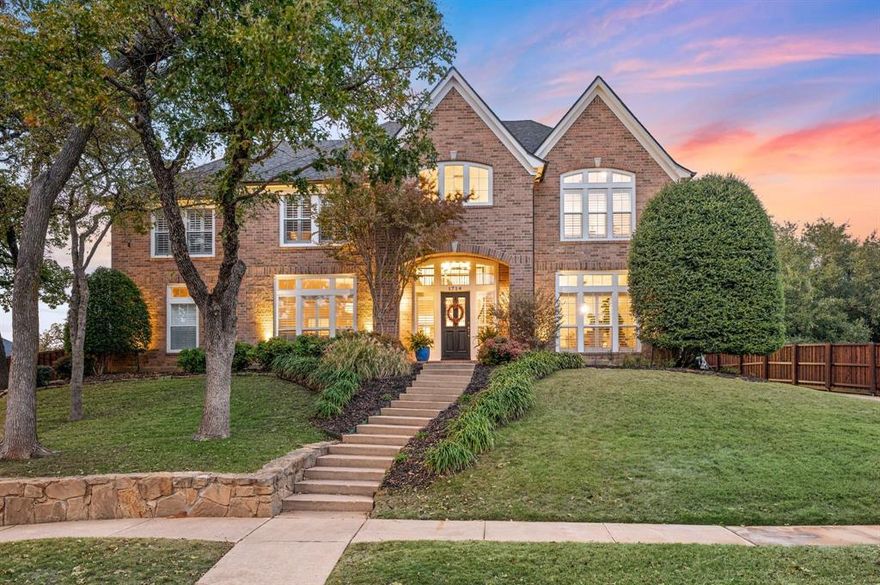 Welcome to this beautifully updated home nestled on an expansive corner lot, just blocks away from the community pond and a variety of shops and restaurants. Located in the highly sought-after Myers Meadow community of Southlake and proudly served by award winning Carroll ISD, this location can't be beat. Inside, natural light fills the home from the moment you enter, highlighting the high ceilings and open feel. The formal dining room and one of two generous living areas flow seamlessly into the open-concept eat-in kitchen complete with a large island, a generous walk-in pantry, ample counter space, open shelving and a full bathroom conveniently located nearby. The second living room features floor-to-ceiling windows that bring in beautiful views of the backyard and patio. The downstairs primary suite offers new windows, dual sinks, a soaking tub, a separate glass shower and two walk in closets for abundant storage. Upstairs, a massive game room with built-in shelving provides the perfect hangout space along with four additional bedrooms and two full bathrooms. Step outside to your own backyard oasis, featuring a sparkling saltwater pool, spa, water feature, and plenty of yard space for relaxing or entertaining. Additional peace of mind comes with a roof that is only two years old. This is an exceptional Southlake opportunity you won't want to miss!