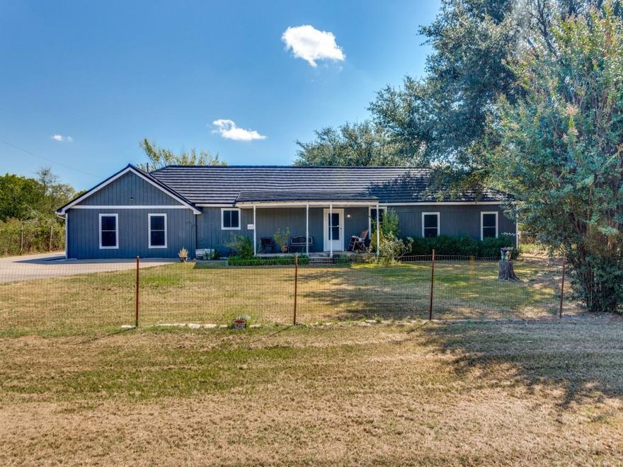 When country charm is just minutes from city living! This inviting 3 bedroom, 2 bath home rests on a spacious lot that offers privacy, flexibility, and room to grow. Towering mature trees frame the property, creating a peaceful backdrop for relaxing evenings or backyard gatherings. Step inside to a large eat-in kitchen and an oversized family room with a cozy wood-burning fireplace, ideal for entertaining or quiet nights in. The generous primary suite features a classic clawfoot tub, giving you a private retreat. Practical upgrade of a two-year-old steel roof for long-lasting durability. With no HOA, you have the freedom to renovate, expand, or simply enjoy the open space as it is. Whether you’re an investor, a DIY enthusiast, or ready to create your dream home, this property combines rural charm with city convenience—a rare opportunity you don’t want to miss.