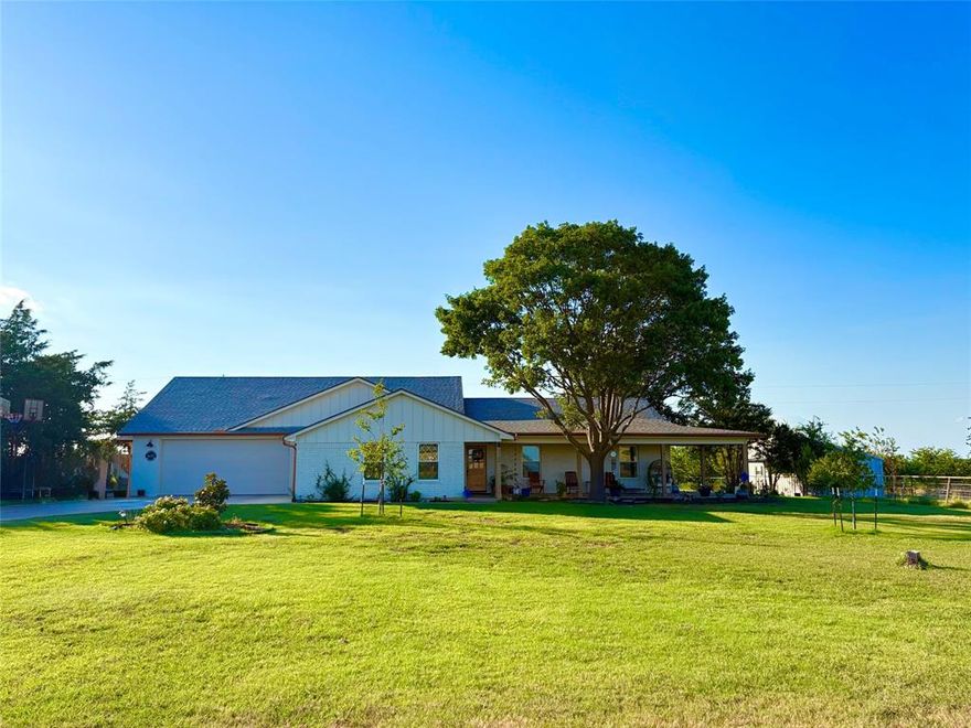 EXTENSIVE RENO + ADDITION. Welcome to 1132 Old Crawford Rd- Picturesque country living with a beautiful interior and the freedom to enjoy your acreage how you want to. 5 bedrooms, 4 bathrooms, 2 living spaces on 7 acres. SEASONAL POND, fenced GARDEN with garden beds, ~1000+ sqft BARN with stalls + feed room and ~375 sqft WORKSHOP (both have water & power). Popular Crawford ISD, NO CITY TAXES! NO KNOWN RESTRICTIONS & ready for your big plans: FENCED & CROSS FENCED with pastures so bring your animals & homestead ambitions! The show stopping kitchen has beautiful Taj Mahal quartzite countertops, natural white oak, Moroccan handmade tile, Cafe appliances & slow-close custom cabinetry. The dining nook overlooks the seemingly endless pastures beyond, making every meal one spent over a million dollar view. The natural light filled Butler’s pantry with counters is made for meal prep, hosting & storing kitchen essentials. Laundry room has exterior access & space for storage or fridge. The primary suite is an oasis by the laundry for utmost convenience. The dreamy ensuite has a custom double vanity flanked by a beautiful shower & soothing freestanding tub ideally set under windows. The living room has a grand vaulted ceiling, fireplace, white oak mantle & custom bench. Off the main living room is the 2nd living space, natural light filled OFFICE & a guest bedroom with its own ensuite bathroom- great for multigen living! Down the hall are 3 bedrooms, including another with its own beautiful ensuite bath. Highend design finishes throughout & guest bathrooms have Carrara marble counters & designer tile. Take in gorgeous views of farmland & treed pastures from the wrap-around front porch + vaulted back porch both with beautiful natural wood tongue + groove ceiling details. Many established and newer TREES adorn the property-oak, pecan, peach, etc. Lots of storage space above the garage. Minutes to Waco & Woodway. Easy access to Hwy 6.