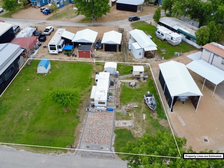 Lots can be sold as 4 lots together 2 storage building, and a camper, 2 lots, or 1 lot CALL FOR PRICING DETAILS

Lots on Richland Chambers Lake offer a rare opportunity to own a piece of peaceful waterfront living in one of North Texas’ most sought-after lake communities. These properties feature beautiful lake views, giving you the perfect backdrop for your dream home or weekend retreat. Whether you’re enjoying quiet mornings with coffee overlooking the water or stunning sunsets in the evening, the scenery never disappoints.
With a mix of open space and natural surroundings, these lots provide plenty of room to build while still maintaining privacy. Conveniently located near town yet far enough away to enjoy the tranquility of lake life, Richland Chambers is known for its excellent fishing, boating, and recreational opportunities. If you’re looking for a place to relax, invest, or build your forever home, these lake-view lots offer the perfect blend of beauty, serenity, and accessibility.