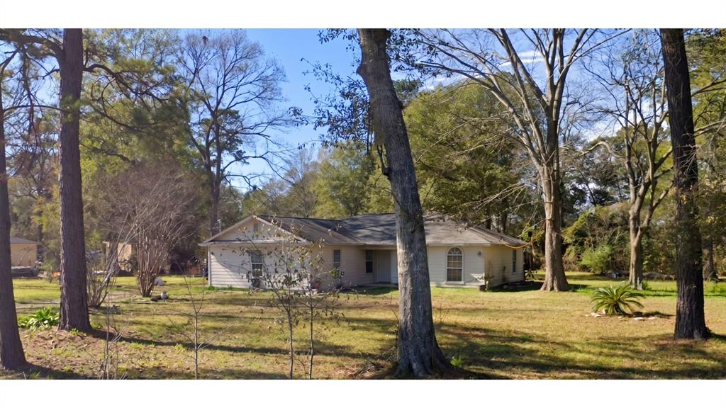 Photo of 12400 Cole Drive, Cleveland, TX 77328 (MLS # 21301153)