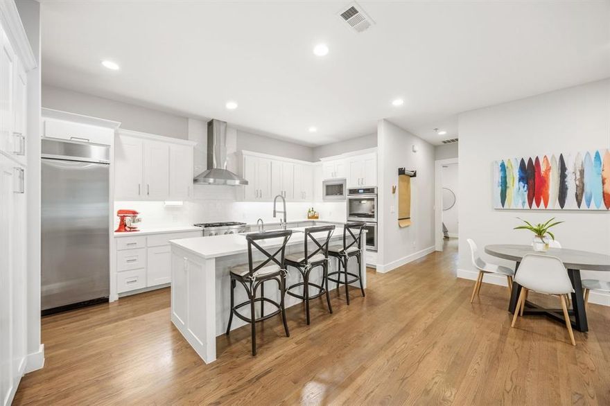 This 1 owner 2017 custom Craftsman Home has the perfect blend of timeless charm and modern luxury. From the moment you arrive the curb appeal pulls you in and the interior doesn’t disappoint. The chefs kitchen and spa inspired primary bath with dramatic see thru fireplace into the primary suite creates a home that feels indulgent every day. Step inside to a light filled foyer, a beautiful staircase and an open layout made for living and entertaining. The huge living room (17 x 31) flows into a chef’s kitchen with premium appliances, including a 6-burner gas cooktop, double oven, and a stunning eat in island for morning coffee, casual meals, or gathering with friends. The flow from the living room into the dining area and chef’s kitchen creates a true heart of the home experience. Enjoy a 1st floor study-living which provides a quiet retreat for work or creativity. There's a private 1st floor suite with ensuite bath, ideal for guests or multi-generational living. Outdoors, a large covered patio invites cooking, dining, and relaxing year-round. Upstairs, the primary suite becomes your oasis with a luxurious bath enhanced by a see thru fireplace and huge custom closet with built in dressers. 2 additional bedrooms and bathrooms with walk in closets, an oversized laundry room with cabinetry, folding area, sink, and a storage closet for everyday ease. Plus, a large flex area for an office, playroom, 2nd living area or whatever suits your lifestyle. From your picturesque covered front porch, enjoy morning walks to Tietze Park, weekend brunches or dinners, and shopping along lower Greenville Ave — life here naturally extends beyond the home. Quick access to Lakewood Village, Downtown Dallas, Katy Trail, and Love Field. This is one of Dallas’ most beloved neighborhoods, tree lined, welcoming, and full of character. A rare blend of craftsmanship, comfort, and location, this home offers a lifestyle that feels elevated and effortless. Come see this home today!