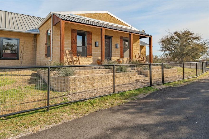 Silverado on the Brazos truly has it all — refined country living with convenient access to Weatherford, Granbury, and Fort Worth. This exceptional equestrian estate spans 18 acres in the highly sought-after Silverado on the Brazos community and is thoughtfully designed. Ideal for trainers, or serious horse enthusiasts. The property features a custom-designed, rustic-finished 1-bedroom, 1-bath, 688 sq ft Barn dominium, a 120’ x 120’ arena, a premium Trojan 60’ panel walker, and a 60’ round pen for additional training space. The land is fully fenced and cross-fenced with pipe no-climb fencing, offering excellent functionality and safety. Eight well-appointed turnouts, each equipped with 16’ x 30’ loafing sheds and automatic water, provide outstanding pasture management. Income-producing opportunities include three additional on-site apartments, ideal for staff housing or rental income. The ranch is further supported by a 10,000-gallon holding tank, ensuring reliable water capacity year-round. Additional improvements include a state-of-the-art 88’ x 40’ horse barn with eight 14’ x 12’ stalls, a feed room, tack room, and wash rack with mare stocks. A spacious 40’ x 60’ hay barn with ample storage completes the working infrastructure.This turnkey equestrian facility offers rare scale, functionality, and versatility in one of Parker County’s premier horse communities — just minutes from Weatherford with easy access to Fort Worth.