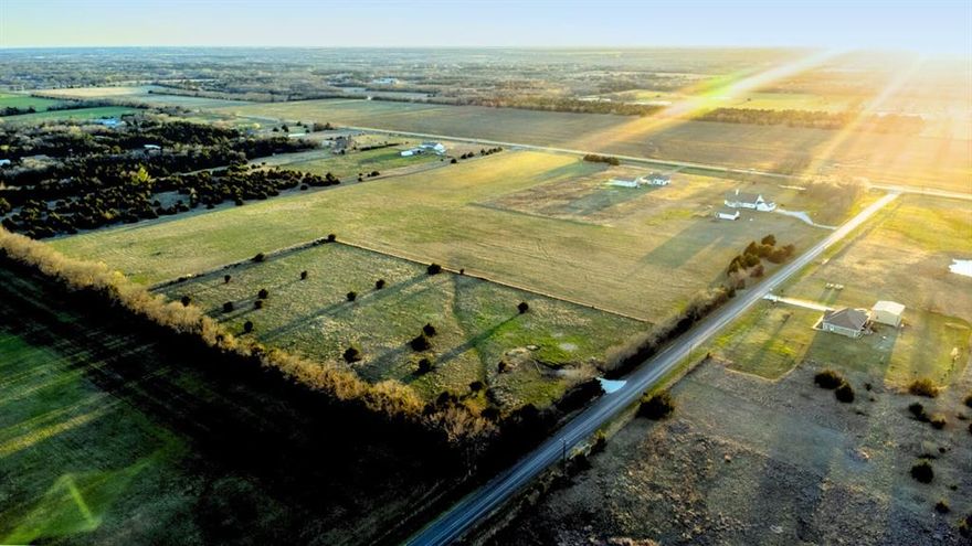 Your ideal homesite awaits—five serene acres ready to become something extraordinary, tailored just for you. Enjoy wide-open skies, quiet surroundings, and the endless potential this property affords. Set among established ranches and homes on land, this beautiful tract offers a sense of escape without sacrificing convenience. Towering cedars along the road provide privacy, while the ideal location places you minutes from major employers, shopping, and preferred mainstream amenities. Located in highly rated Anna ISD, with utilities available, this is the perfect canvas to bring your vision to life. Build the lifestyle you’ve imagined in a setting that feels like home from the moment you arrive.