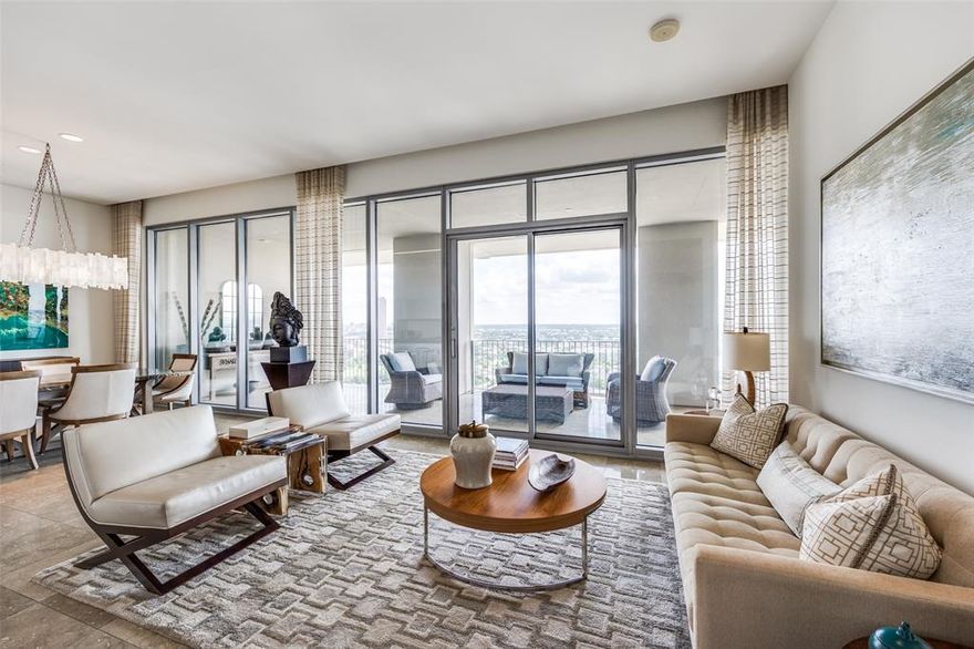 Experience the best in luxury high rise living in the Lionel Morrison designed One Arts Plaza building! Located in the heart of the Arts District, this one bedroom, one and a half bath residence is within walking distance to the Dallas Museum of Art, Meyerson Symphony Center, Moody Performance Hall, and Winspear Opera House. Elegance abounds in this sleek and modern unit with eleven foot ceilings, floor to ceiling windows, and a 50 X 10 foot covered terrace overlooking East Dallas. Natural light flows through the living room and dining area creating an ideal entertaining space, or also a quiet space to just relax. Open Balthaup kitchen offers island, eat in kitchen, Miele appliances, subzero wine cooler plus an integrated refrigerator and freezer.
The primary bedroom includes a sliding glass door to the terrace, a spa worthy bathroom with separate tub and shower, and custom closet space. A versatile office space is located off the primary bedroom. In addition to this fabulous downtown Dallas location within close proximity to fine dining and shopping, One Arts amenities include a pool, fitness center, doorman, valet, 24 hour security and concierge, event room, electric car chargers, and two assigned parking spaces.