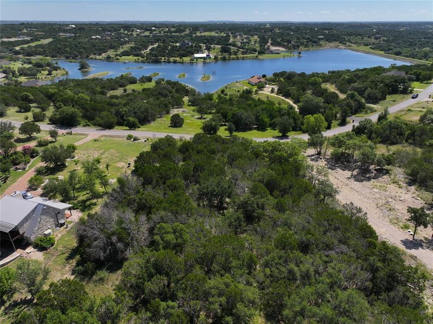 Ready to build your dream home? This beautifully wooded lot spans just over an acre, blanketed with majestic, mature trees that offer natural privacy and refreshing shade. Nestled just outside Bluff Dale, TX, the property blends peaceful country living with convenient access to Stephenville and Granbury. Located in the desirable Mountain Lakes community, residents enjoy amenities such as serene lakes, stocked fishing ponds, a community pool, and more. Don’t miss this opportunity to create your perfect retreat in a setting that truly has it all. Property will require a septic system.