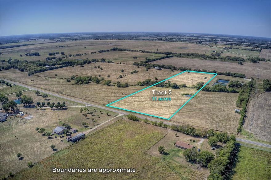 Experience the tranquility of Northeast Texas with this expansive 11-acre tract in Fannin County, just northeast of McKinney. Use 1 acre as homestead, and keep the remaining land under the current ag exemption. This land includes an approved permit from TXDOT for a private driveway. A picturesque seasonal creek winds through the landscape, bordered by trees and complemented by a small tank, creating a serene and natural setting. With minimal deed restrictions, you have the freedom to shape this land into your ideal retreat. Utilities are readily accessible, making development straightforward. Conveniently positioned a short 7-minute drive from Highway 121 and only 35 minutes away from McKinney’s growing amenities, this property offers the best of both worlds - embrace the peaceful country lifestyle while remaining close to city conveniences.  Come explore the potential of this beautiful land!